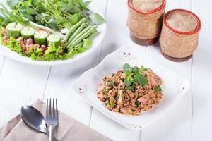 Spicy minced pork salad , Thai food photo