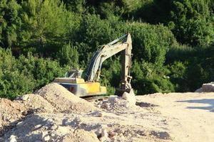 Nahariya Israel March 4, 2020. A large excavator is working at a construction site. photo