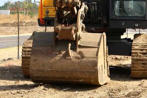 Nahariya Israel March 4, 2020. A large excavator is working at a construction site. photo