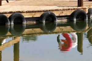 Acre Israel December 19, 2020. Berth for mooring boats and yachts in the seaport. photo