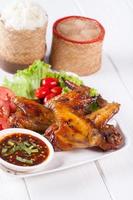 Grilled Chicken Wings with Red Spicy Sauce and Sticky Rice photo