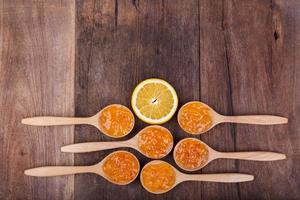 fresh orange with orange jam photo