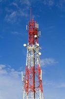 Communication tower with blue sky photo