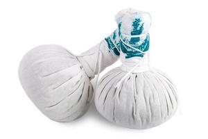 Herbal compress balls for spa treatment photo