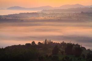 misty morning sunrise in mountain at Khao-kho Phetchabun,Thailand photo