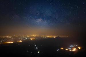 Milky way galaxy at Phutabberk Phetchabun in Thailand.Long exposure photograph.With grain photo