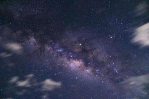 Milky way with cloud sky, Long exposure photograph.with grain photo