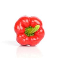 ripe red bell pepper on white background photo