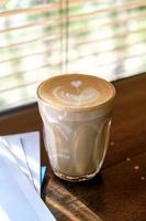 Coffee latte art in coffee shop photo