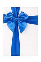 White gift Box with blue ribbon Isolated on white background photo