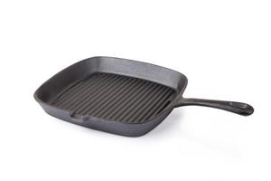 Empty grill iron pan isolated on white background photo