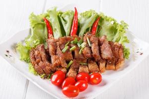 streaky pork fried with spicy dipping sauce, Thai food photo