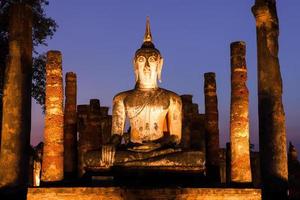 Ancient buddha statue. Sukhothai Historical Park, Sukhothai Province, Thailand photo