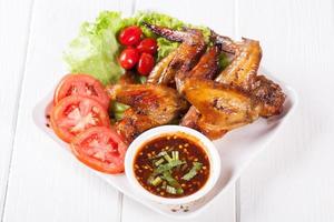 Grilled Chicken Wings with Red Spicy Sauce photo