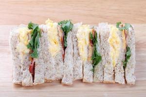 sandwich on wood table photo