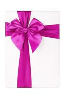 White gift Box with pink ribbon Isolated on white background photo