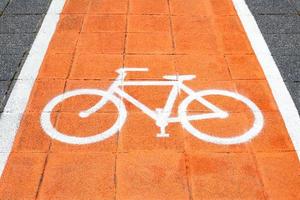 Bike lane and white bike symbol photo