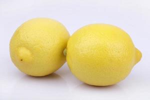 Fresh lemon on white background photo