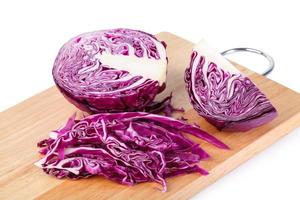 red cabbage on wood table photo