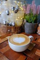 latte art coffee in coffee shop photo