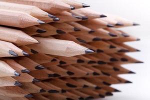 One sharpened pencil among many ones photo