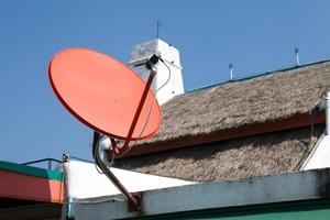 red satellite on roof photo