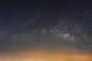 Panorama Milky way galaxy bridge as seen from thailand on a clear summer night. photo