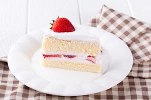 Strawberry Cheesecake on table photo