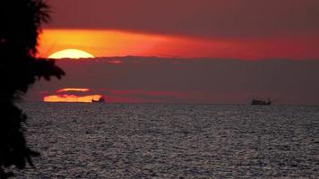 Sunset over ocean landscape with JetSki, Karon beach, Phuket, Thailand video