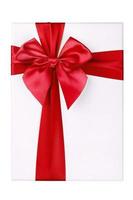 White gift Box with red ribbon Isolated on white background photo