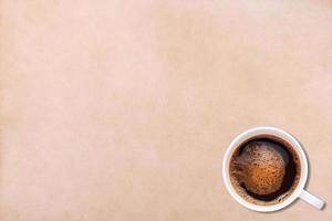 papel en blanco y una taza de café foto