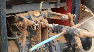 The iron corners of the motorbike that have been damaged hit the ground because they have been used too much on unpaved roads photo