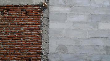 The concept of the outer walls of the house and the old house tiles have a unique texture photo