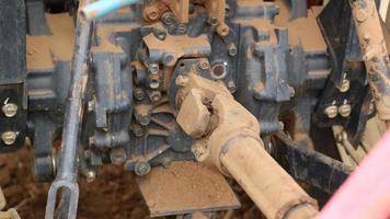 The iron corners of the motorbike that have been damaged hit the ground because they have been used too much on unpaved roads photo