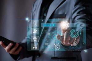 Business database analysis concept. Businessman analyzing economic data. related to business operations, analysis of future economic trends, virtual screens, business networking, internet technology. photo