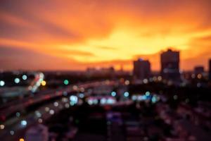 Blur photo background of Bangkok cityscape at twilight time.