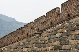 la gran muralla de las almenas chinas de cerca foto