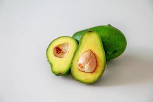 Ripe avocado on white background. photo