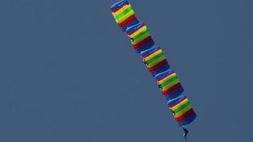 NOVOSIBIRSK, RUSSIAN FEDERATION JULY 28, 2019 - Paratrooper aerobatic team with rainbow parachutes. Airshow at the Mochishe aerodrome UNNM video