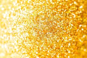 Golden shiny glitter texture background. Happy new year and Christmas background. photo