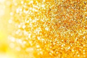 Golden shiny glitter texture background. Happy new year and Christmas background. photo