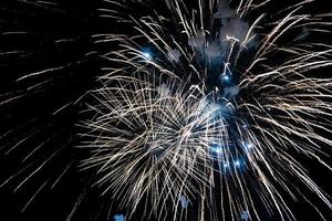 Fireworks with a dark black background, Bright beautiful colorful firework. Festive concept. photo