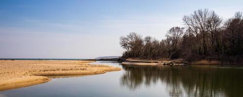 Panoramic view of large estuary of the Kamchia River, flowing into the Black Sea, Bulgaria photo