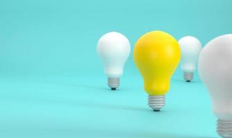 The yellow light bulb outstanding from the white light bulb. Demonstrates creativity, thinking, intelligence and imagination, taking photos using depth of field.