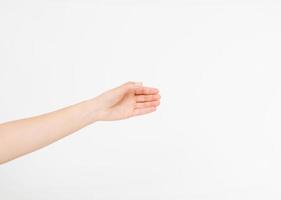 female hand measuring invisible items, woman's palm making gesture while showing small amount of something on white isolated background, side view, close-up, cutout, copy space photo