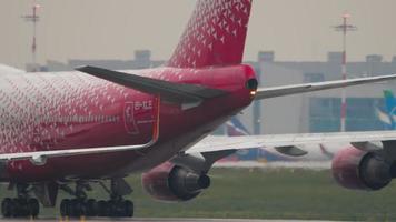 MOSCOW, RUSSIAN FEDERATION JULY 28, 2021 - Boeing 747 EI XLE Rossiya taxiing at Sheremetyevo Airport SVO. Jumbo jet on the airfield. Traffic at Sheremetyevo airport video