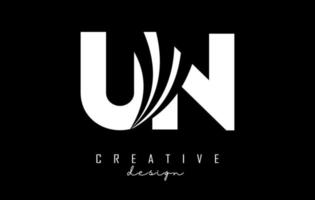 Creative white letters UN u n logo with leading lines and road concept design. Letters with geometric design. vector