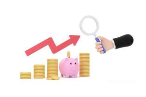 hand holding magnifying glass and piggy bank and coins concept saving money. Investment finance business. photo