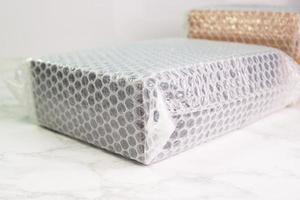 Bubbles covering the box by bubble wrap for protection product cracked  or insurance During transit photo