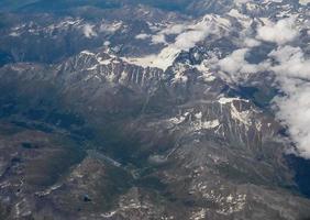 Aerial view of Alps mountains photo